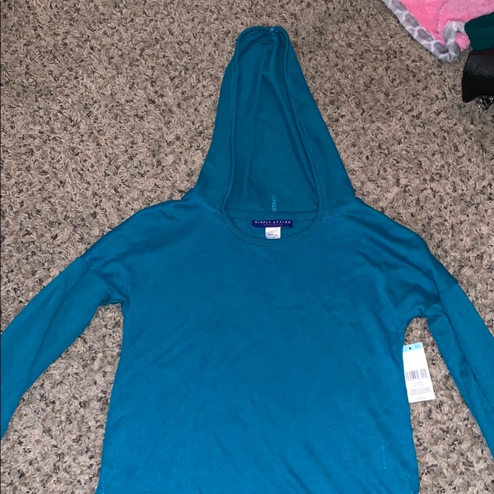 Long sleeve shirt with hood.